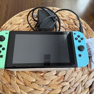 Nintendo Switch with Mint Green Left Joy-Con and Light Blue Right Joy-Con